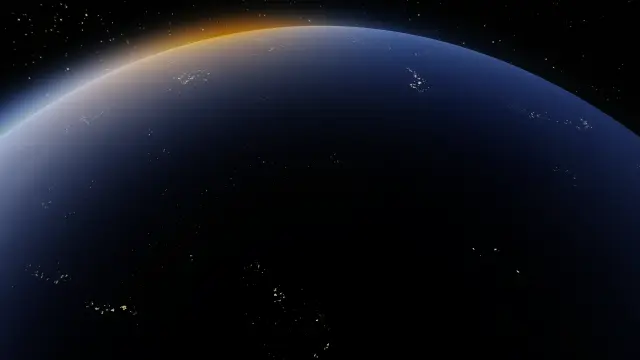 Night side with city lights and atmospheric scattering at the terminator